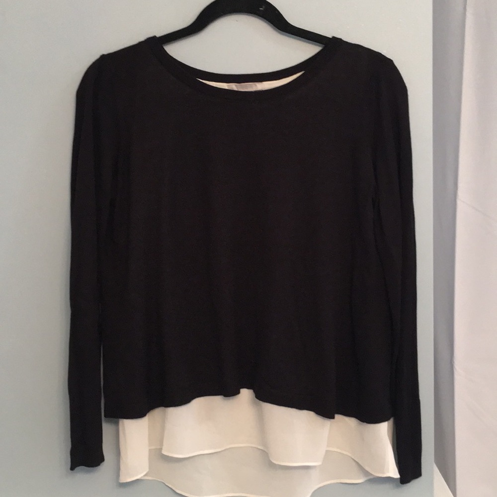 Layered black sweater